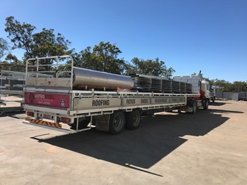 Truck Loaded with Sheds to deliver